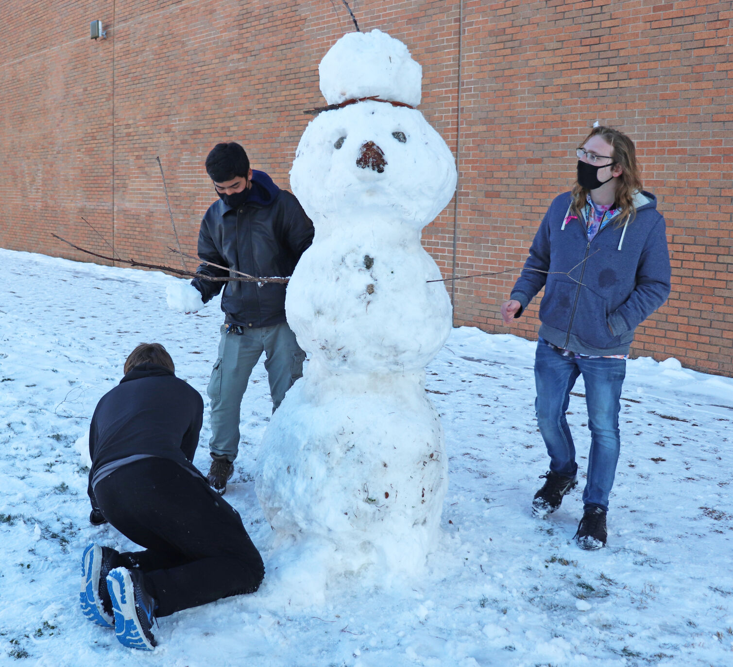 Photos: UTA students take advantage of the snowfall blanketing campus